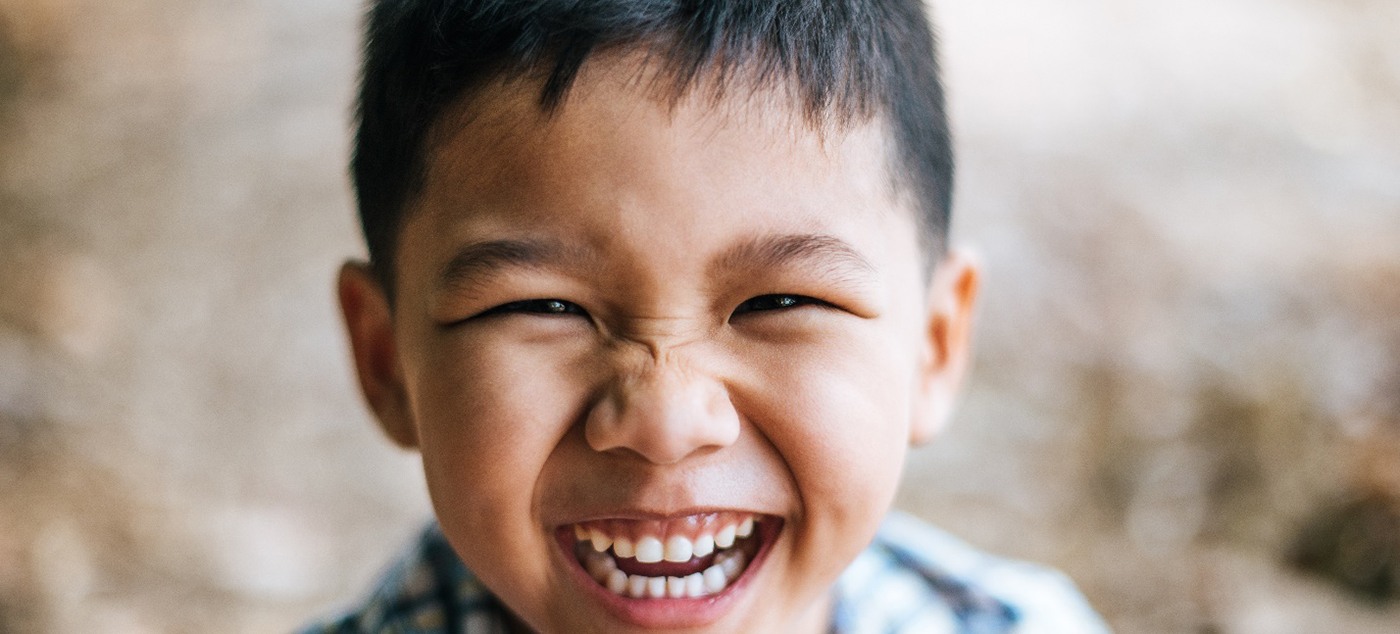 closeup of young boy smiling